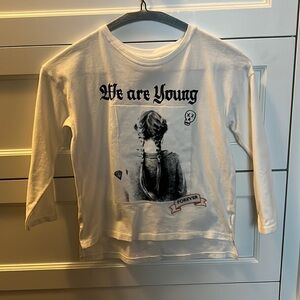 Zara Girls’ “We Are Young” White Long-Sleeved Top